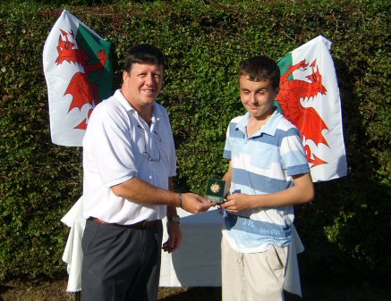 Runner up Daniel Ball receiving his medal